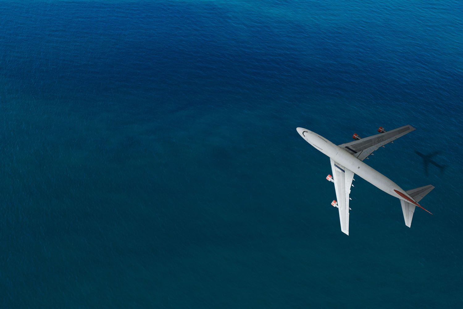 Plane over the ocean