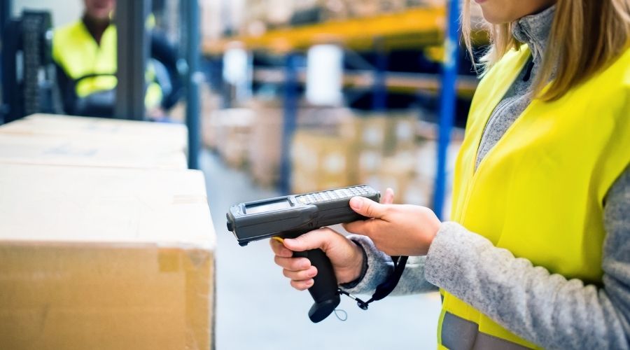 A woman scans a packaging