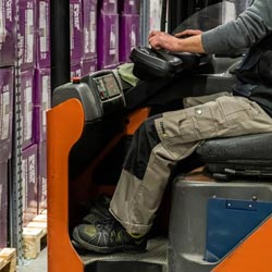 A man on a forklift truck