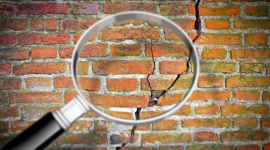 magnifying glass on a wall