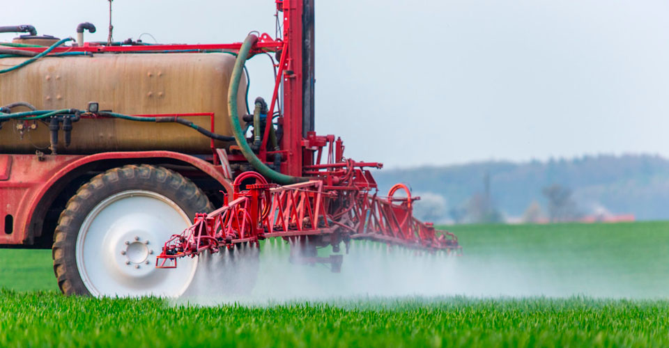 Tractor applying fertiliser