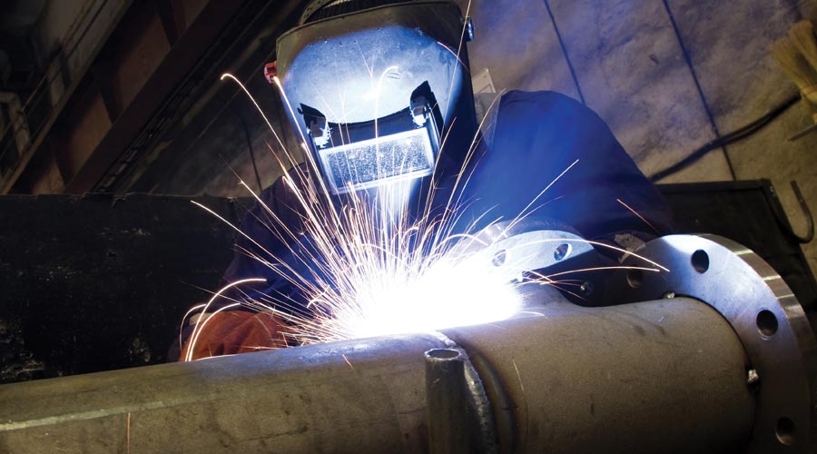 man welding