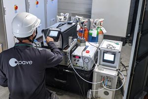 Apave employee carrying out tests and measurements on pressure vessels