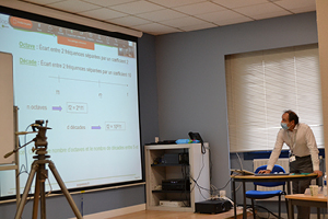 A teacher presenting during a webclass