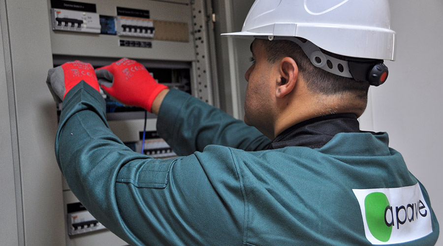 Apave employee working on an electrical installation