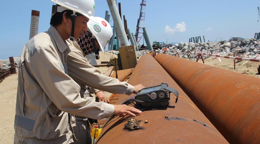 Apave engineer processing an NDT control