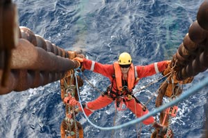 A rope access technician carries out regulatory checks